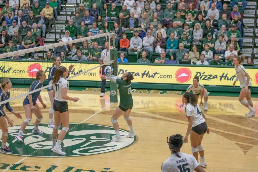 Alexa Roumeliotis (8) bumps the ball up towards Setter Katie Oleksak, during the University's game against Utah State on Nov.14 at home. CSU wins three sets to zero. (Devin Cornelius | Collegian)