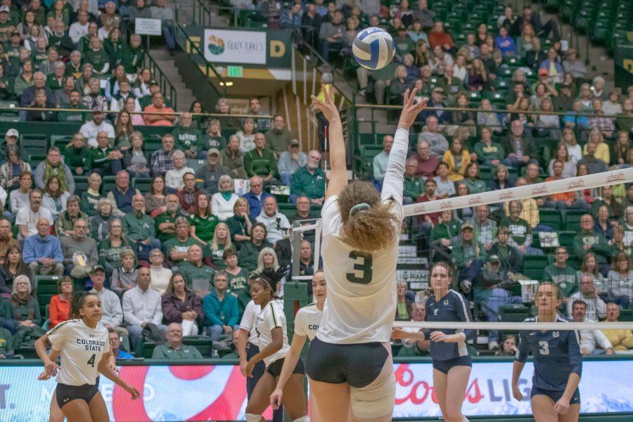 Olivia Nicholson (3) sets the ball up into the air, as the University faces Utah State at home on Nov 14. CSU wins three sets to zero. (Devin Cornelius | Collegian)