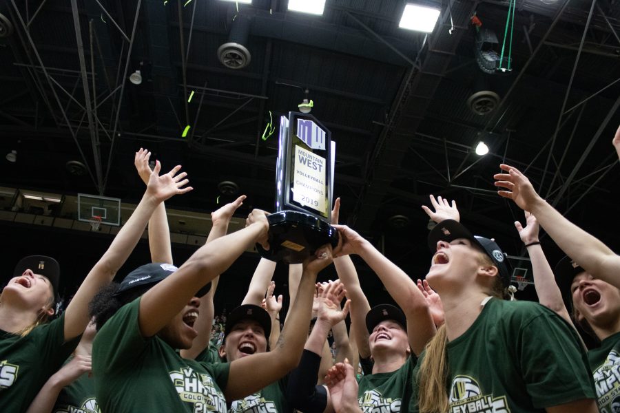 The Colorado State University volleyball team celebrates winning the Mountain West Conference Nov. 16, 2019. (Devin Cornelius | The Collegian)