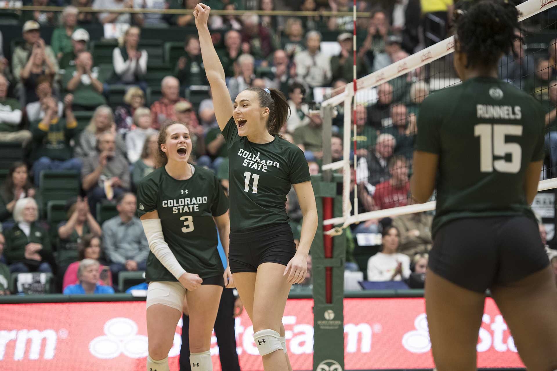 volleyball players on court