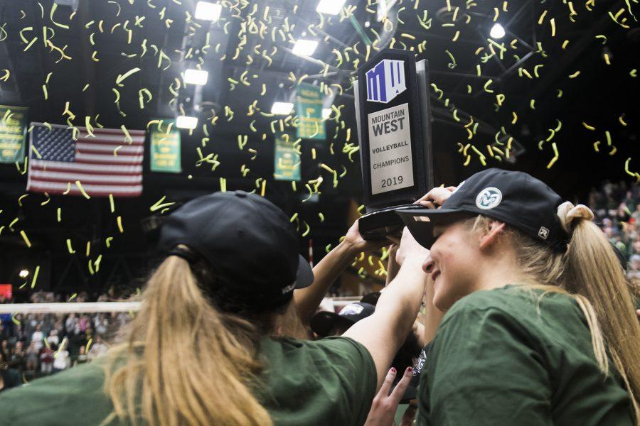 The Colorado State University women’s volleyball team holds up the 2019 Mountain West Conference Championship trophy, Nov. 16, 2019. (Lucy Morantz | The Collegian)