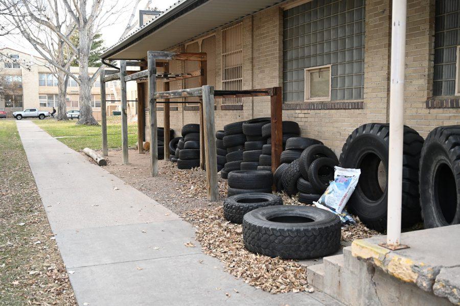 training materials for ROTC sit behind a building. (Luke Bourland | The Collegian) 