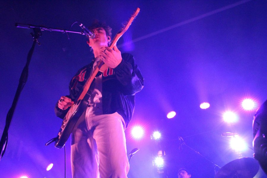 Jake Luppen, lead singer and guitarist in the indie-rock band Hippo Campus, performs the title track from their latest Album, Bambiat Washingtons off of N College and Laporte. Nov 12. (Alyssa Uhl | The Collegian)