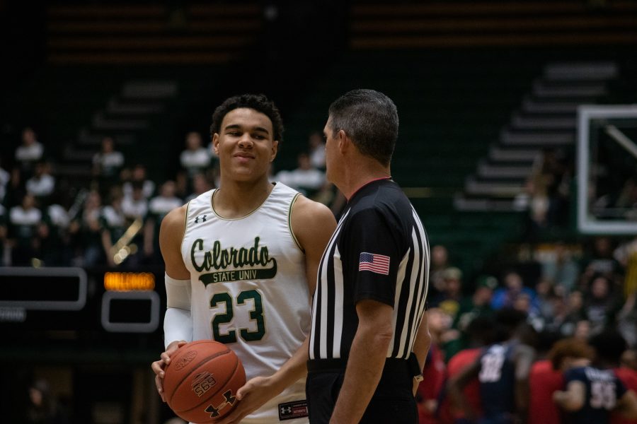 John Tonje (23) talks with the referee before the start of the second half, during Coloraod State's home game against Fresno State. CSU wins 86-68. (Devin Cornelius | Collegian)