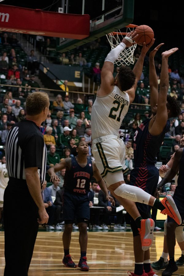 David Roddy (21) slams the ball into the basket, during the Colorado State home game vs Fresno State. CSU wins 86-68. (Devin Cornelius | Collegian)