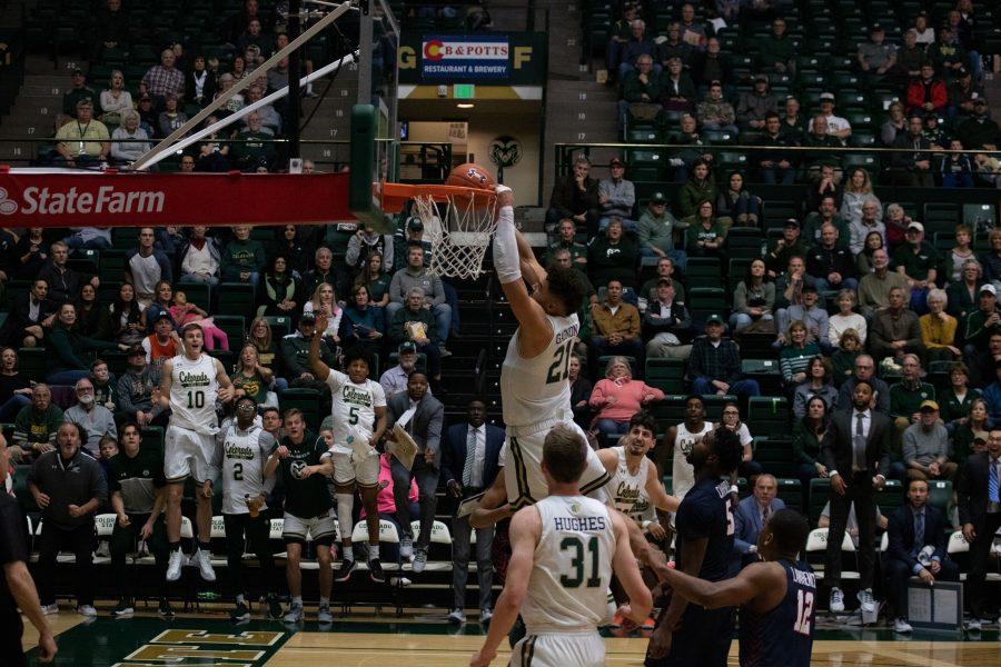 David Roddy (21) dunks the ball and the crowd celebrates, during the Colorado State game against Fresno University. CSU wins 86-68. (Devin Cornelius | Collegian)