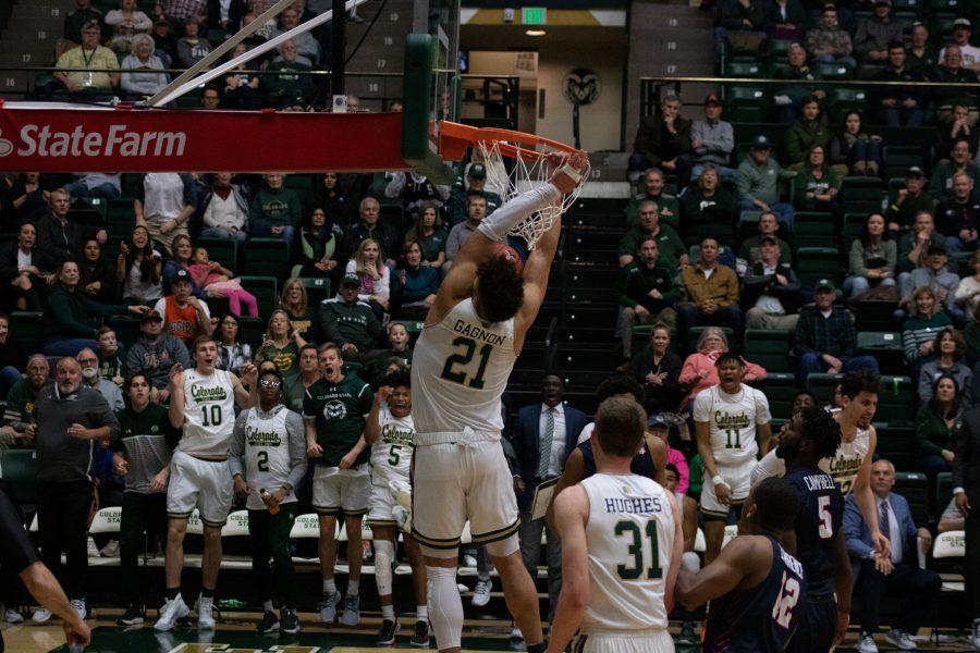 David Roddy (21) dunks the ball and the crowd celebrates, during the Colorado State game against Fresno University. CSU wins 86-68. (Devin Cornelius | Collegian)