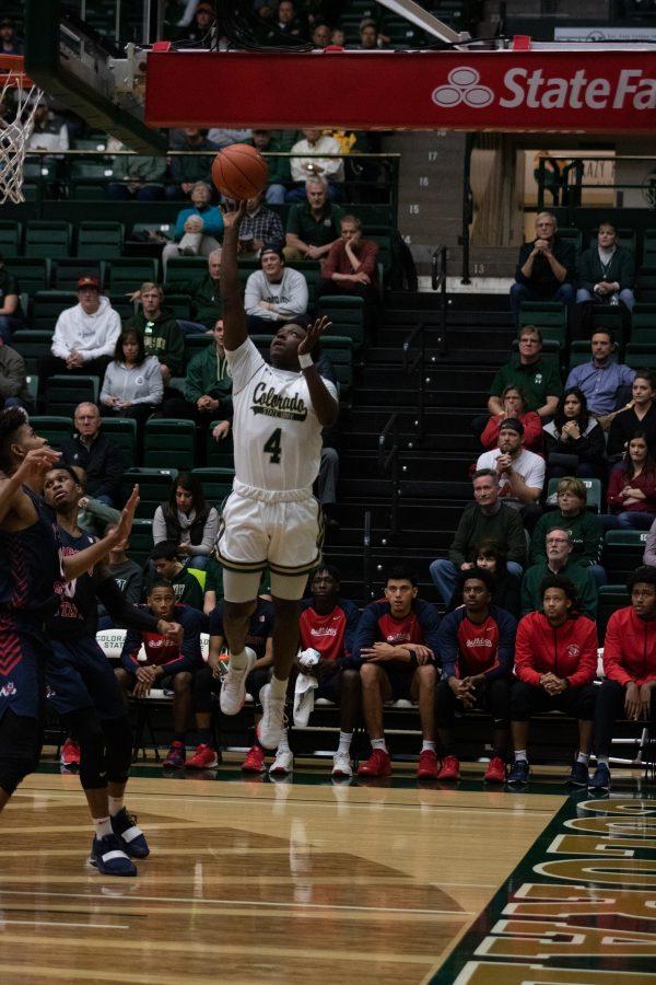 Isaiah Stevens (4) shoots from the corner of the court, during the Colorado State home game against Fresno State. CSU wins 86-68. (Devin Cornelius | Collegian)