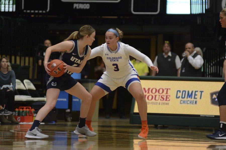 Colorado State point guard Megan Jacobs defends Utah State point guard Steph Gorman in the Ram’s 56-55 nailbiter win on Jan 25. The win brings the Rams even at 10-10 overall on the season and 4-5 in conference play. (Gregory James | The Collegian)