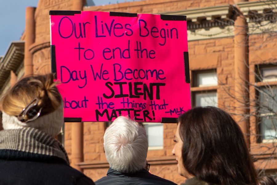 Members of the Fort Collins community gather downtown for a march to the Colorado State University Lory Student Center in celebration of Dr. Martin Luther King Jr. Day. (Brooke Buchan | The Collegian) 