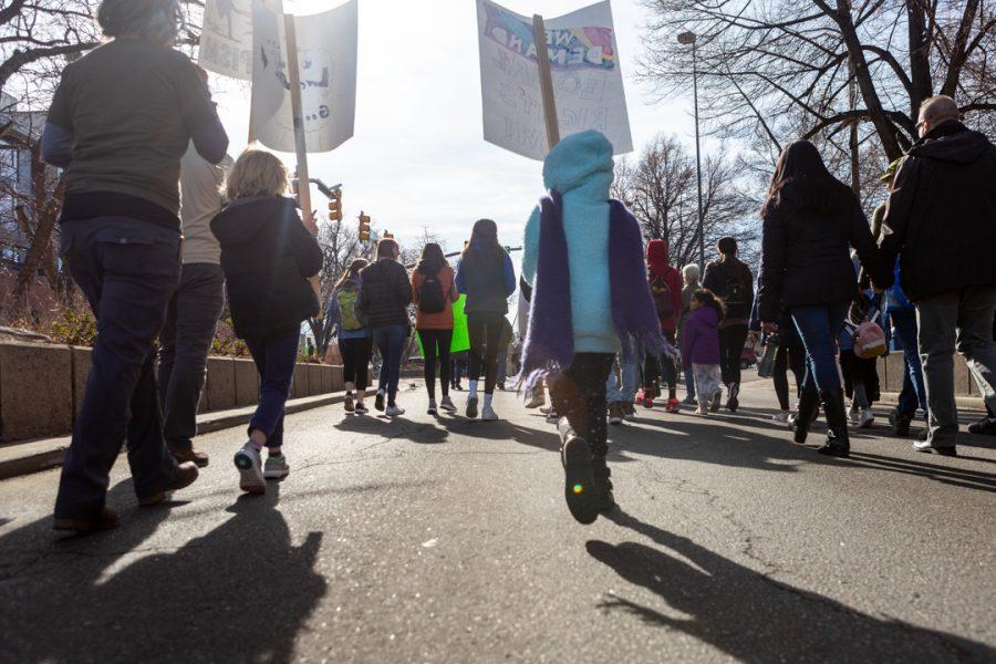 Members of the Fort Collins community gather downtown for a march to the Colorado State University Lory Student Center in celebration of Dr. Martin Luther King Jr. Day. (Brooke Buchan | The Collegian) 