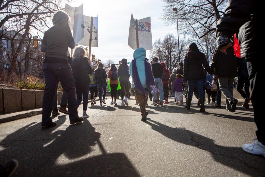 Members of the Fort Collins community gather downtown for a march to the Colorado State University Lory Student Center in celebration of Dr. Martin Luther King Jr. Day. (Brooke Buchan | The Collegian) 