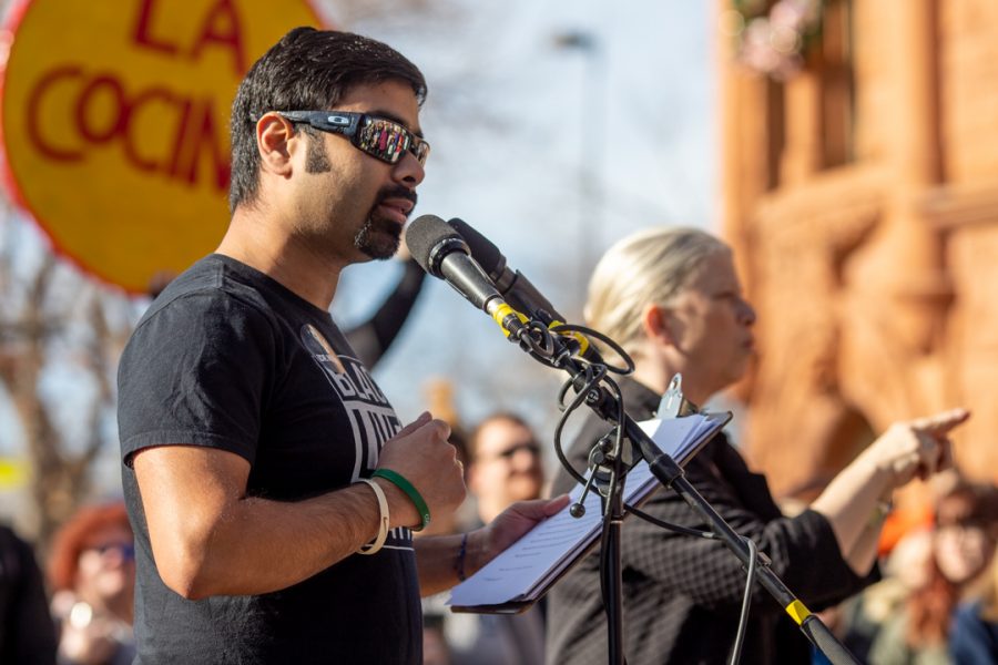 Lory Student Center Program Coordinator, Ali Raza, speaks at the Dr. Martin Luther King Jr. downtown march Monday, Jan. 20. (Brooke Buchan | The Collegian)