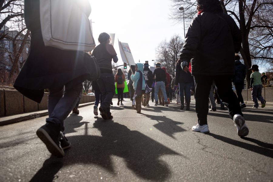 Members of the Fort Collins community gather downtown for a march to the Colorado State University Lory Student Center in celebration of Dr. Martin Luther King Jr. Day. (Brooke Buchan | The Collegian) 