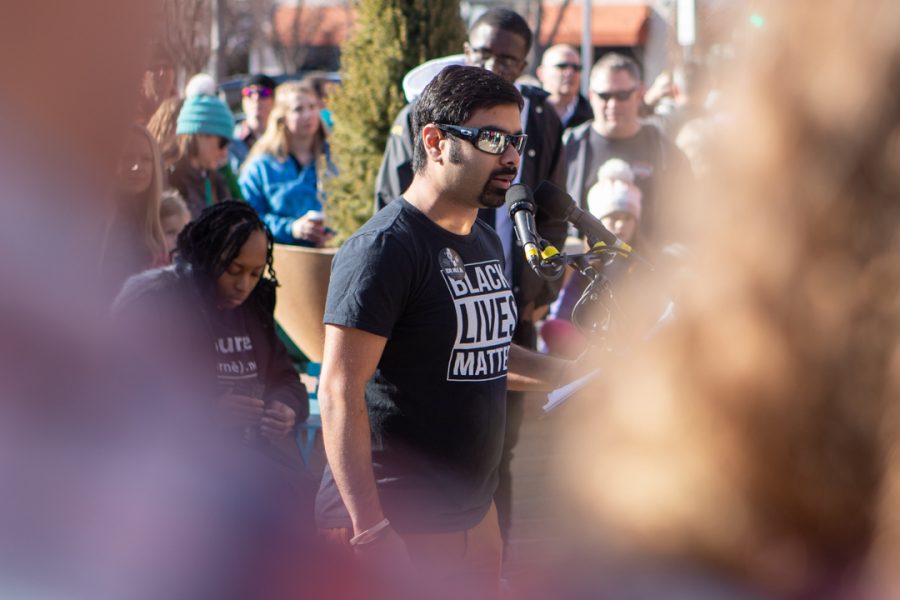 Lory Student Center Program Coordinator, Ali Raza, speaks at the Dr. Martin Luther King Jr. downtown march Monday, Jan. 20. (Brooke Buchan | The Collegian)