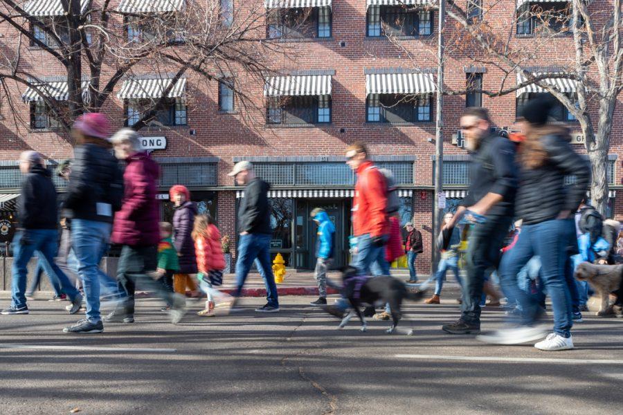 Members of the Fort Collins community gather downtown for a march to the Colorado State University Lory Student Center in celebration of Dr. Martin Luther King Jr. Day. (Brooke Buchan | The Collegian) 