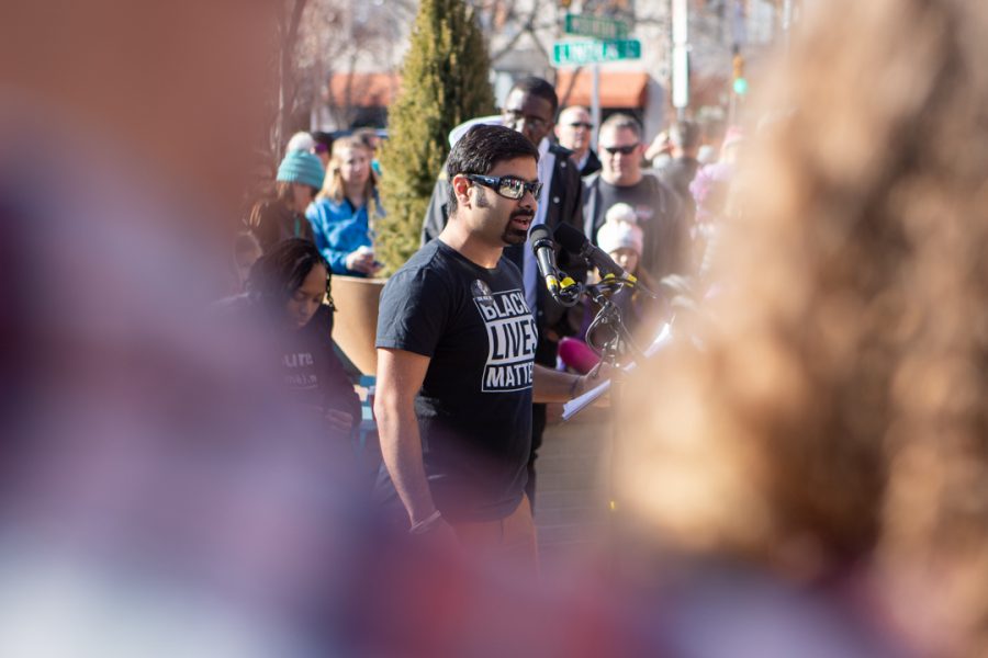Lory Student Center Program Coordinator, Ali Raza, speaks at the Dr. Martin Luther King Jr. downtown march Monday, Jan. 20. (Brooke Buchan | The Collegian)