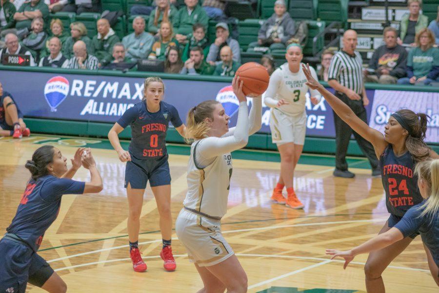 Makenzie Ellis (11) shoots with defenders all around her, during the Colorado State home game against Fresno State University on Feb 5, 2020. CSU falls to the Bulldogs 79-61. (Devin Cornelius | Collegian)