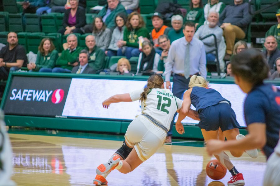 Jamie Bonnarens (12) Dives for the loose ball, during the Colorado State home game against Fresno State University on Feb 5, 2020. CSU falls 79-61. (Devin Cornelius | Collegian)