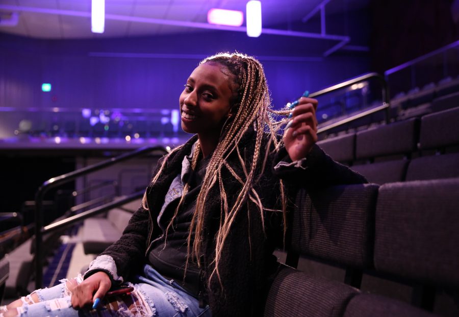 Hanggatu Abdullahi shows off her box braids following the United Women of Color Hair Show in the Lory Student Center Theater Feb. 9. Abdullahi traveled from the University of Northern Colorado to watch the show and support her friends who were competing. (Forrest Czarnecki | The Collegian)