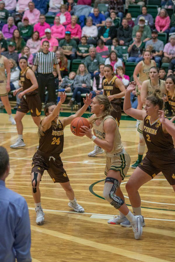 Andrea Brady (32) passes the ball, during the University home game against Wyoming on Feb 15, 2020. CSU loses 43-40. (Devin Cornelius | Collegian)