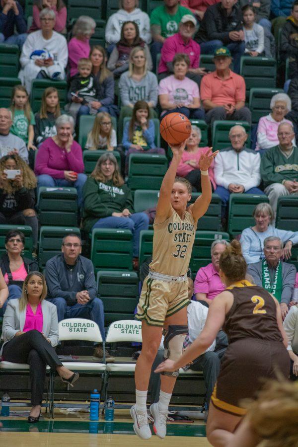Andrea Brady (32) shoots a three pointer, during the University home game vs Wyoming on Feb 15, 2020. CSU loses 
 43-40. (Devin Cornelius | Collegian)