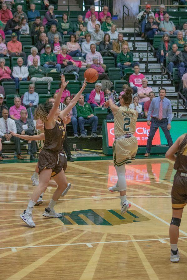 Tori Williams (2) makes a jumping pass to a teammate, during the Colorado State home game vs Wyoming on Feb 15, 2020. CSU falls 43-40. (Devin Cornelius | Collegian)