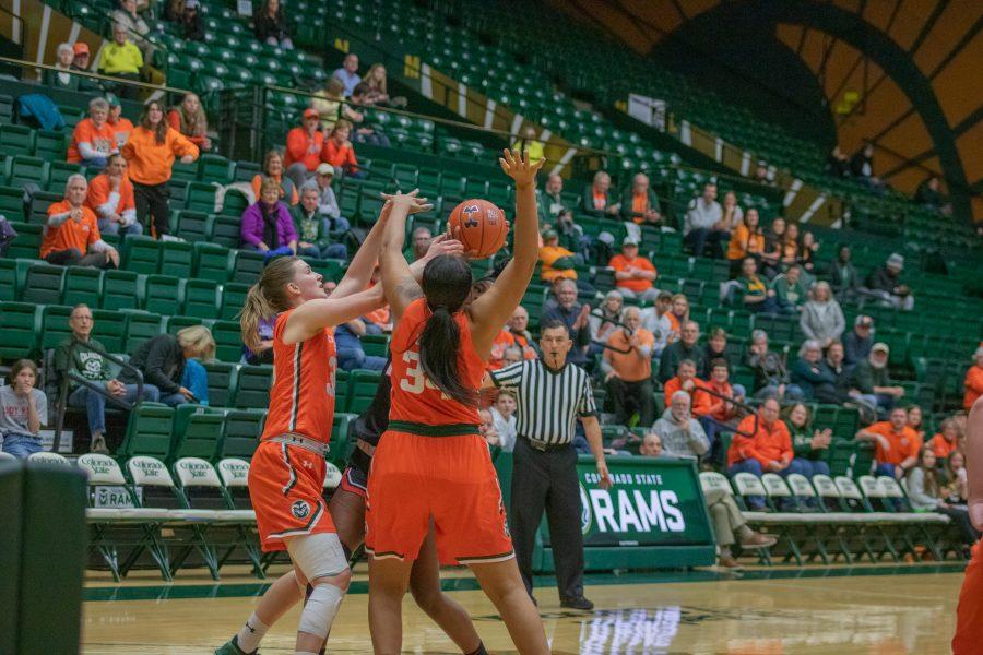Lor Devos (35) knocks the ball out of an opponent's hands as she and Liah Davis (34) defend the basket, during the University's home game against the University of Las Vegas, Nevada. CSU wins 60-56. (Devin Cornelius | Collegian)