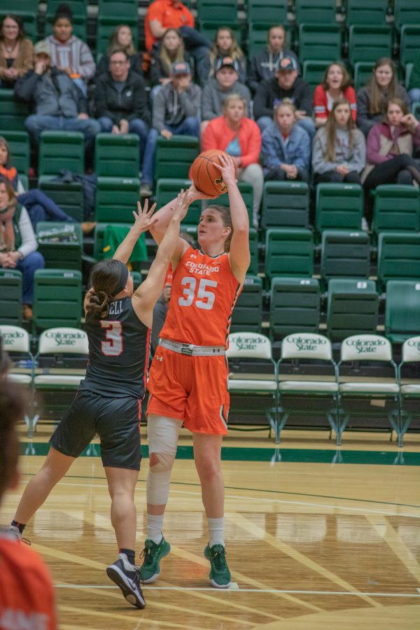 Lore Devos (35) spins and shoots over a defender, during the Colorado State home game vs the University of Las Vegas, Nevada on Feb 19 2020. CSU wins 60-56. (Devin Cornelius | Collegian)