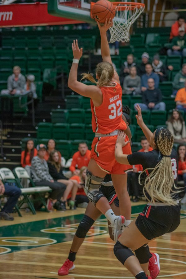 Andrea Brady (32) drives past a defender and makes a layup under the basket, during the Colorado State home game vs the University of Las Vegas, Nevada on 
 Feb 19, 2020. CSU wins 60-56. (Devin Cornelius | Collegian)