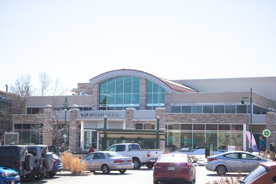 Cars are parked outside of the Lory Student Center. Colorado State University is planning a $25 million dollar renovation of this side of the building. (Devin Cornelius | Collegian)