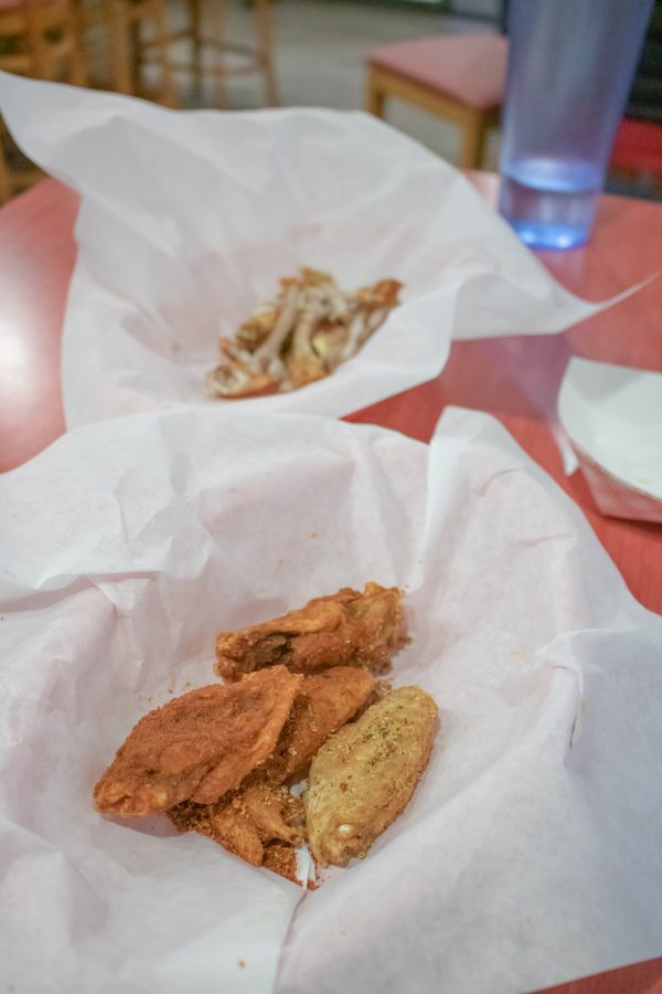 Cajun and Lemon Pepper dry rub sauces at Wing Shack. Wing Shack offers a variety of sauces for their wings. (Devin Cornelius | Collegian)