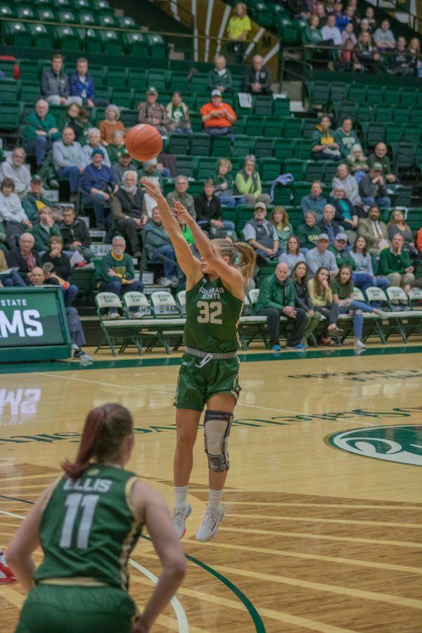 Andrea Brady (32) take a shot from the three point line, during the Colorado State home game vs San Diego State University. CSU falls in OT 64-61. (Devin Cornelius | Collegian)