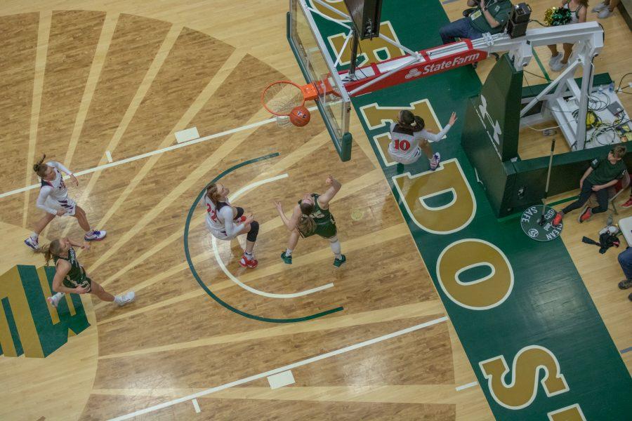Lore Devos (35) makes a layup, during the Colorado State home game against San Diego State University. CSU falls in overtime 64-61. (Devin Cornelius | Collegian)