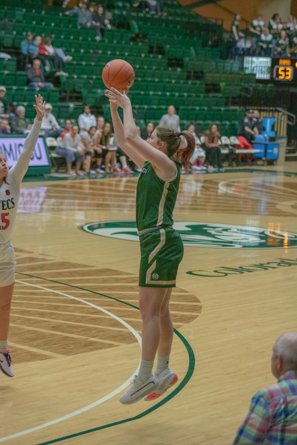 Makenzie Ellis (11) takes a three point jump shot,  during the Colorado State home game against San Diego State University. CSU loses in OT 64-61(Devin Cornelius | Collegian)