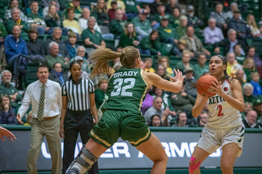 Andrea Brady (32) attempts to block a San Diego State University player, during the Colorado State home game vs SDSU. CSU wins 64-61. (Devin Cornelius | Collegian)