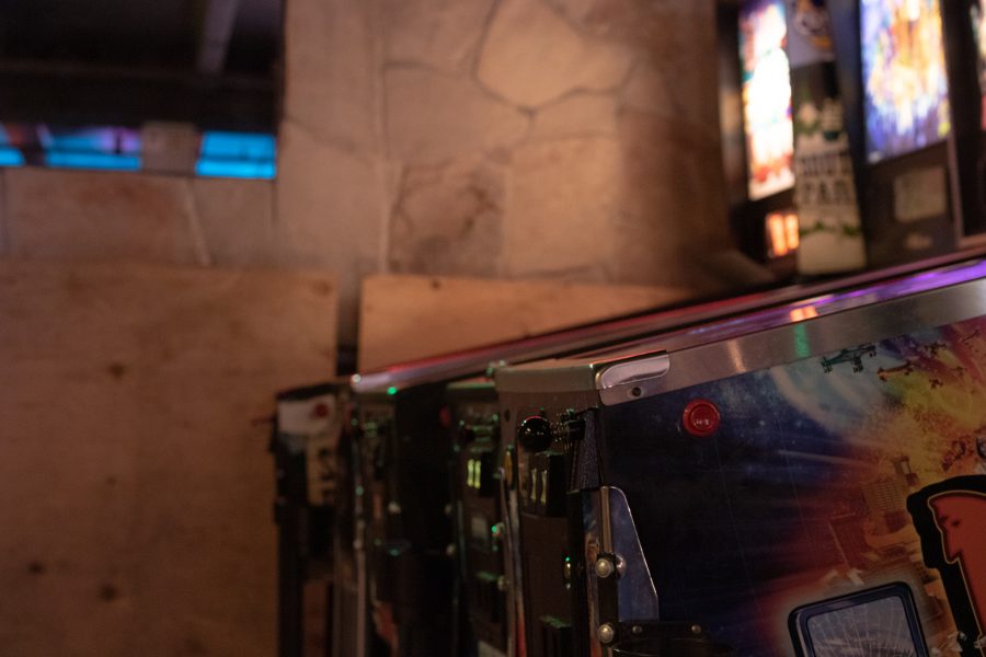 A Button on the side of a pinball machine at Pinball Jones. Pinball Jones has lots of pinball machines to play on for quarters. (Devin Cornelius | Collegian)