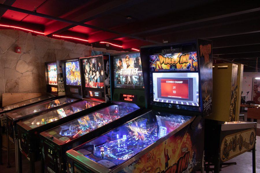 Several pinball machines in Pinball Jones. Pinball Jones has a bar and retro arcade games.  (Devin Cornelius | Collegian)