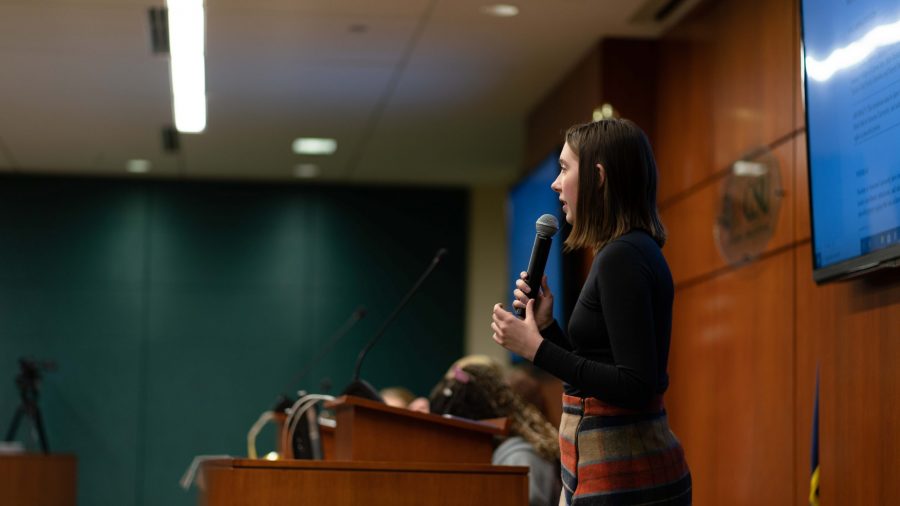Senator Sara Dudek presents a resolution that shows support for student protestors at Syracuse University. (Nathan Tran | The Colleigan) 