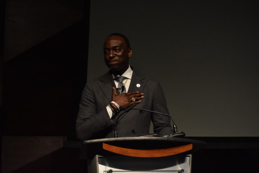 Dr. Yusef Salaam of the exonerated Central Park Five puts his hand to his heart during his keynote presentation for Black History Month in the Lory Student Center Theatre Feb. 4. (Gabrielle Arregoces | The Collegian) 