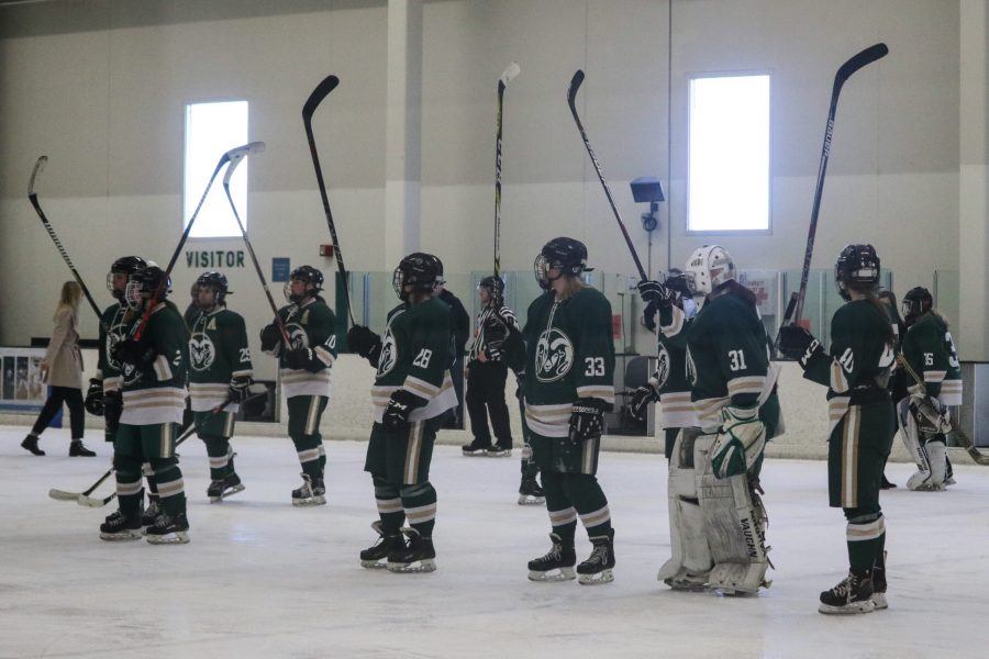Colorado State University women's hockey players face the crowd and raise their hockey sticks after the Rams' 4-2 victory against University of Utah at Edora Pool Ice Center Feb. 15, 2020. (Anna von Pechmann | The Collegian) 