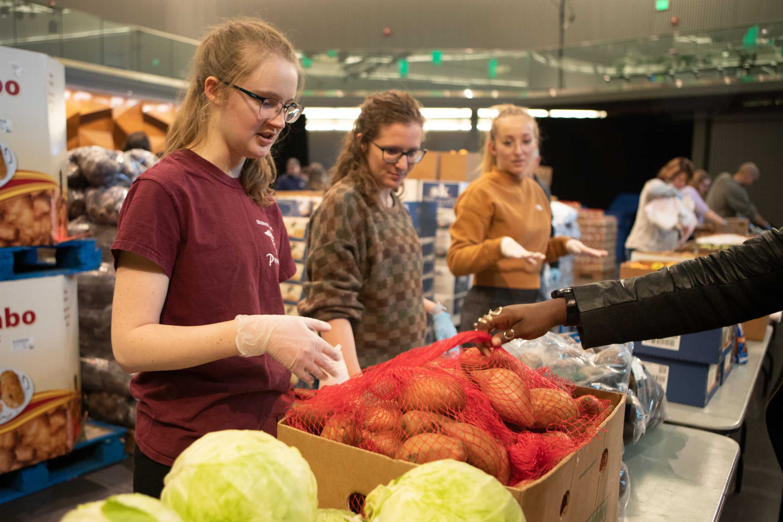 people voluneer at a food bank