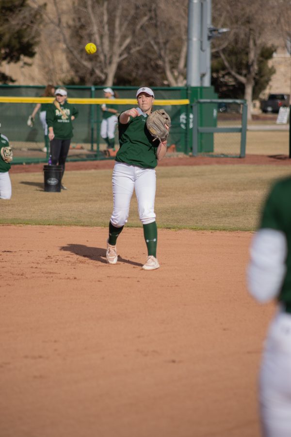 Ashley Ruis (18) throws the ball to her teammates, during a drill at practice on Mar. 3, 2020. (Devin Cornelius | Collegian)