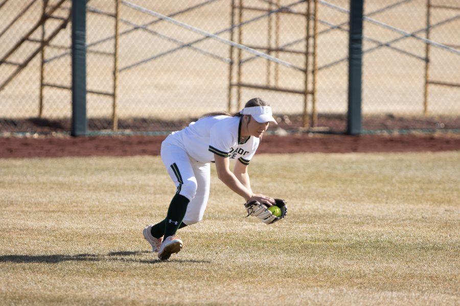 Ashley Michelena (4) scoops up a ground ball, during the University's game against Kennesaw State University at the Colorado State classic softball tournament on Mar. 6, 2020. CSU loses 1-3. (Devin Cornelius | Collegian)