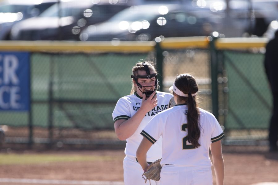 Taylor Gilmore (6) smiles while talking to Corina Gamboa (2), during the University's game against Kennesaw State University at the Colorado State classic softball tournament on Mar. 6, 2020. CSU loses 1-3. (Devin Cornelius | Collegian)
