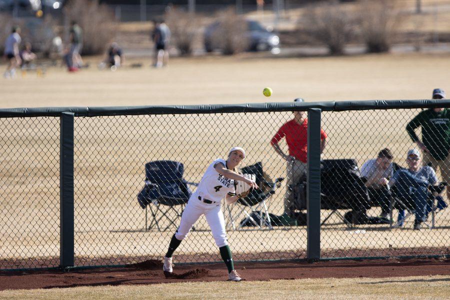 Ashley Michelena (4) throws the ball towards the infield, during the University's game against Kennesaw State University at the Colorado State classic softball tournament on Mar. 6, 2020. CSU loses 1-3. (Devin Cornelius | Collegian)
