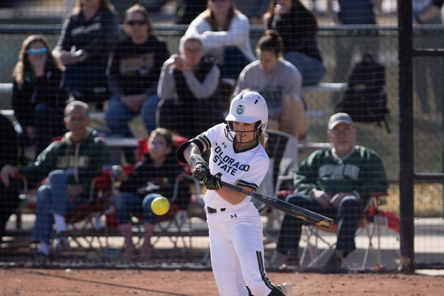 Ashley Michelena (4) hits the ball, during the University's game against Kennesaw State University at the Colorado State classic softball tournament on Mar. 6, 2020. CSU loses 1-3. (Devin Cornelius | Collegian)
