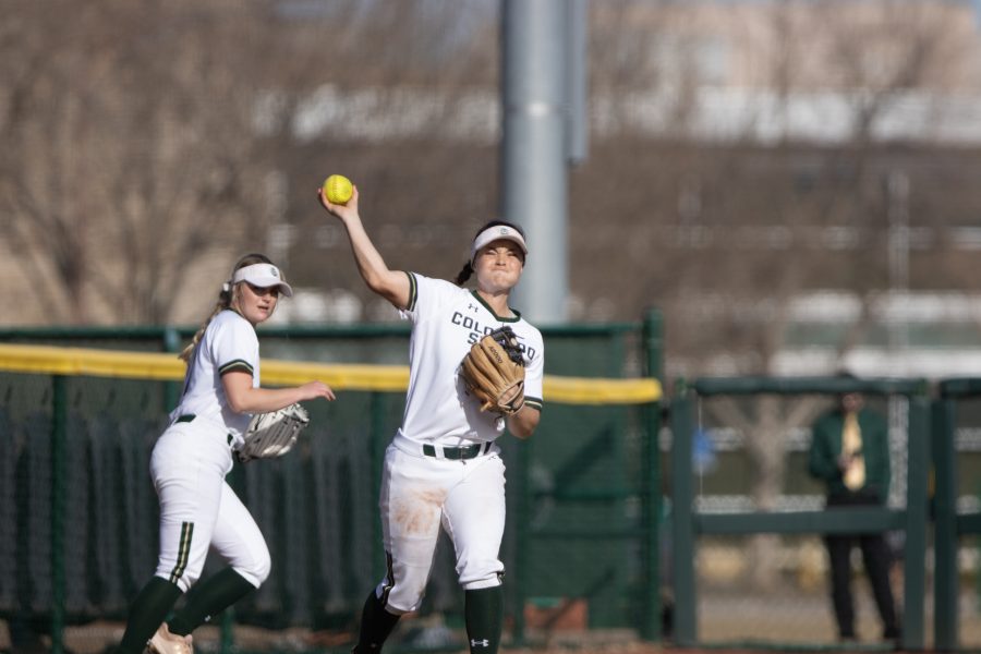 Corina Gamboa (2) throws the ball towards the infield, during the University's game against Kennesaw State University at the Colorado State classic softball tournament on Mar. 6, 2020. CSU loses 1-3. (Devin Cornelius | Collegian)