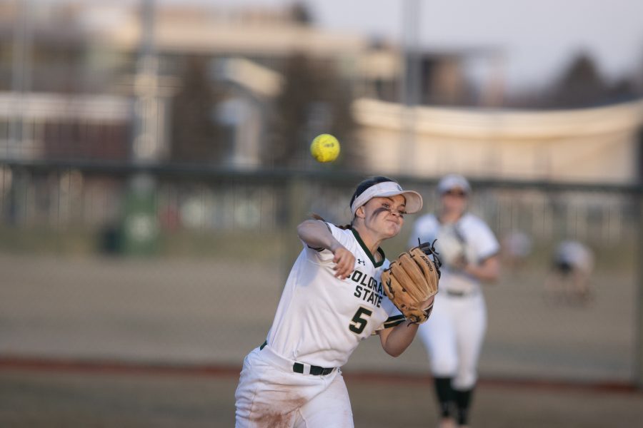 Haley Donaldson (5) throws the ball into the infield, during the University's first game against Purdue University at the Colorado State classic softball tournament on Mar. 6, 2020. CSU wins 11-5.  (Devin Cornelius | Collegian)