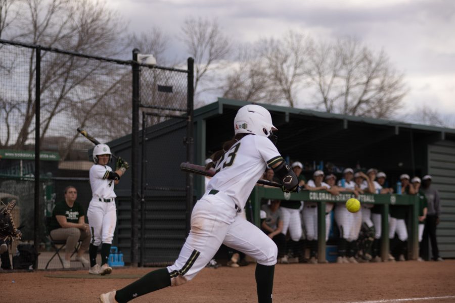 Jordan Acosta (23) bunts the ball down by home plate, during the University's second game vs Purdue at the Colorado State classic softball tournament on Mar. 8, 2020. CSU wins 4-3.  (Devin Cornelius | Collegian)